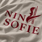 NINA SOFIE T-Shirt – Sand · Front & Back Logo